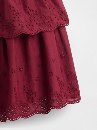 Abito con occhielli in tecnica mista per bambini