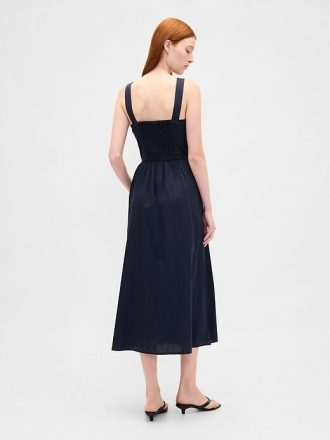 Abito lungo con vita bassa e cuciture