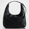 Borsa a tracolla in pelle vegana effetto ciottoli