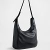 Borsa a tracolla in pelle vegana effetto ciottoli