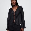 Camicia con nodo frontale in lino 100% Camicia con nodo frontale in lino 100%