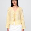 Camicia con nodo frontale in lino 100% Camicia con nodo frontale in lino 100%