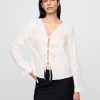 Camicia con nodo frontale in lino 100% Camicia con nodo frontale in lino 100%