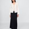 Camicia con nodo frontale in lino 100% Camicia con nodo frontale in lino 100%