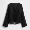 Camicia con nodo frontale in lino 100% Camicia con nodo frontale in lino 100%