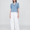 Camicia in denim con maniche a sbuffo e colletto Camicia in denim con maniche a sbuffo e colletto