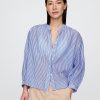 Camicia trasparente con bottoni sul davanti Camicia trasparente con bottoni sul davanti