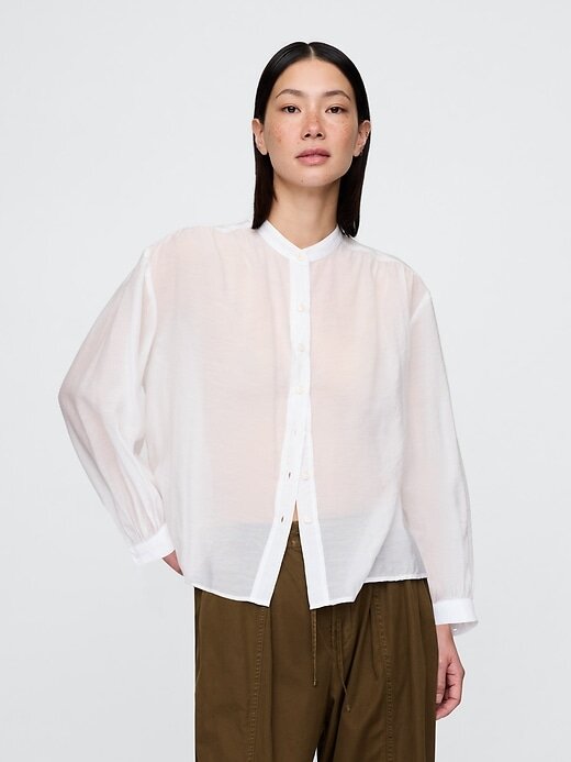 Camicia trasparente con bottoni sul davanti Camicia trasparente con bottoni sul davanti