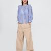 Camicia trasparente con bottoni sul davanti Camicia trasparente con bottoni sul davanti