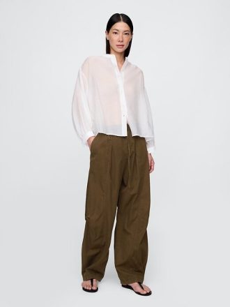 Camicia trasparente con bottoni sul davanti