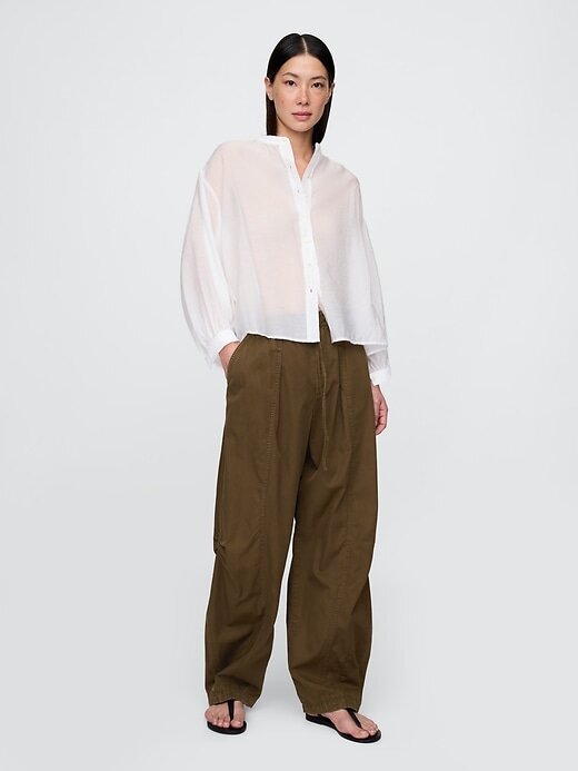 Camicia trasparente con bottoni sul davanti Camicia trasparente con bottoni sul davanti