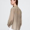 Camicia trasparente con bottoni sul davanti Camicia trasparente con bottoni sul davanti