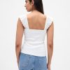 Canotta moderna con svolazzi sulle costole Canotta moderna con svolazzi sulle costole