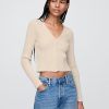 Cardigan corto a coste intrecciate