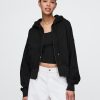 Felpa con cappuccio oversize in spugna francese con zip e zeppa Felpa con cappuccio oversize in spugna francese con zip e zeppa