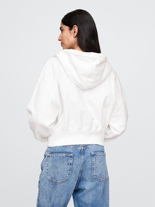 Felpa con cappuccio oversize in spugna francese con zip e zeppa Felpa con cappuccio oversize in spugna francese con zip e zeppa