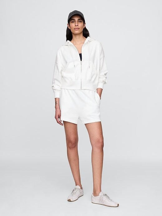 Felpa con cappuccio oversize in spugna francese con zip e zeppa Felpa con cappuccio oversize in spugna francese con zip e zeppa