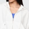 Felpa con cappuccio oversize in spugna francese con zip e zeppa Felpa con cappuccio oversize in spugna francese con zip e zeppa