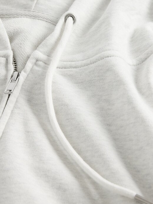 Felpa con cappuccio oversize in spugna francese con zip e zeppa Felpa con cappuccio oversize in spugna francese con zip e zeppa
