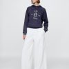 Felpa con cappuccio raglan con logo Gap × DÔEN per adulti Felpa con cappuccio raglan con logo Gap × DÔEN per adulti