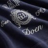 Felpa con cappuccio raglan con logo Gap × DÔEN per adulti Felpa con cappuccio raglan con logo Gap × DÔEN per adulti