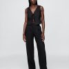Gilet corto in misto lino con nodo sul davanti