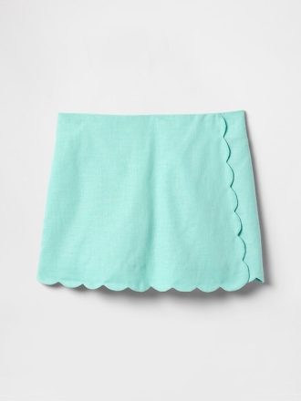 Gonna-pantalone avvolgente smerlata in lino e cotone per bambini