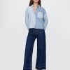 Jeans a gamba larga High Stride alla caviglia Jeans a gamba larga High Stride alla caviglia