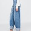 Jeans larghi e pesanti della tuta Jeans larghi e pesanti della tuta