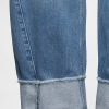 Jeans larghi e pesanti della tuta Jeans larghi e pesanti della tuta