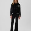 Jeans a zampa anni ’70 a vita alta per bambini Jeans a zampa anni ’70 a vita alta per bambini