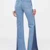Jeans a zampa anni ’70 con toppe a vita alta Jeans a zampa anni ’70 con toppe a vita alta