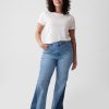 Jeans a zampa anni ’70 con toppe a vita alta Jeans a zampa anni ’70 con toppe a vita alta