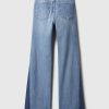 Jeans a zampa anni ’70 con toppe a vita alta Jeans a zampa anni ’70 con toppe a vita alta