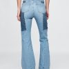 Jeans a zampa patchwork anni ’70 a vita alta