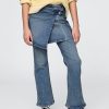 Jeans a zampa per bambini con gonna avvolgente Jeans a zampa per bambini con gonna avvolgente