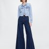 Jeans a zampa rilassati a vita alta Jeans a zampa rilassati a vita alta