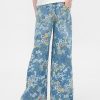 Jeans larghi e facili da indossare per bambini con motivo floreale