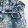 Jeans larghi e facili da indossare per bambini con motivo floreale