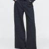 Jeans larghi e pesanti della tuta Jeans larghi e pesanti della tuta