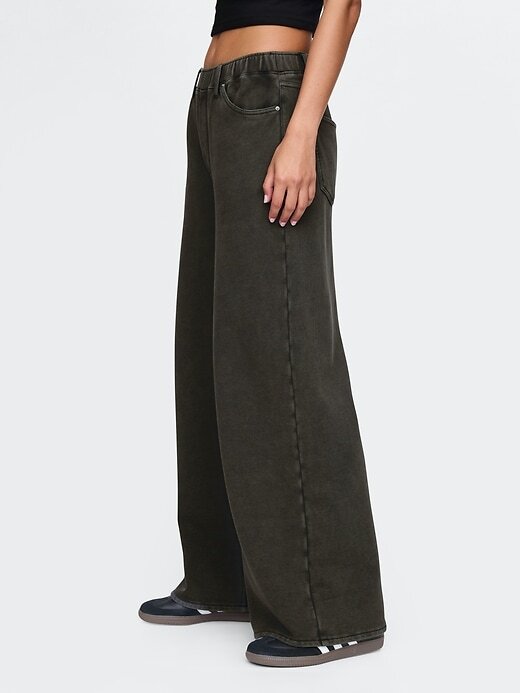 Jeans larghi e pesanti della tuta Jeans larghi e pesanti della tuta