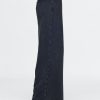 Jeans larghi e pesanti della tuta Jeans larghi e pesanti della tuta