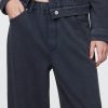 Jeans larghi e pesanti della tuta Jeans larghi e pesanti della tuta