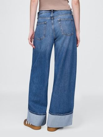 Jeans larghi ultra morbidi a vita media con risvolto