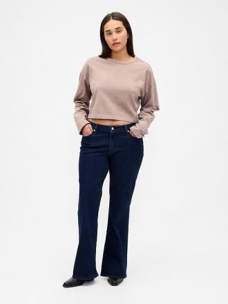 Jeans lunghi e attillati a vita bassa e sinuosa