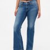 Jeans lunghi e attillati a vita bassa e sinuosa Jeans lunghi e attillati a vita bassa e sinuosa