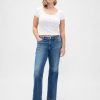 Jeans lunghi e attillati a vita bassa e sinuosa Jeans lunghi e attillati a vita bassa e sinuosa