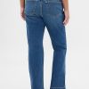 Jeans lunghi e attillati a vita bassa e sinuosa Jeans lunghi e attillati a vita bassa e sinuosa
