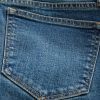 Jeans lunghi e attillati a vita bassa e sinuosa Jeans lunghi e attillati a vita bassa e sinuosa