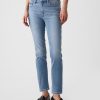 Jeans slim vintage a vita media con orlo diviso Jeans slim vintage a vita media con orlo diviso